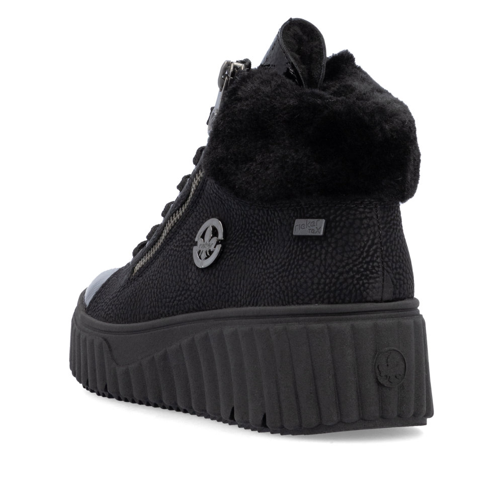 detail Dámská kotníková obuv Rieker N2505-00 černá