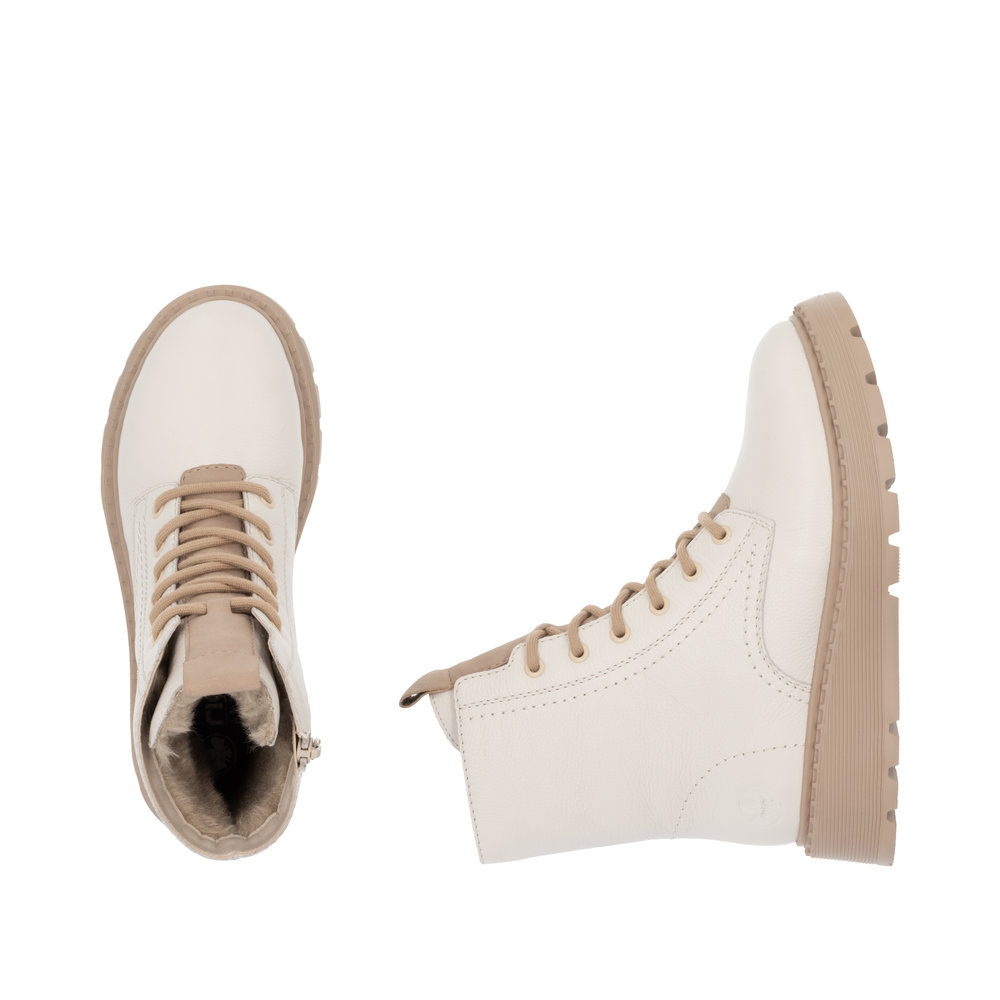 detail Dámská kotníková obuv Rieker 70404-80 béžovo-bílá