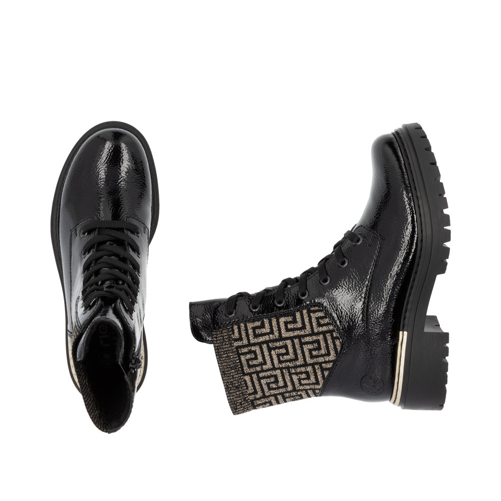 detail Dámská kotníková obuv Rieker 72607-00 černá