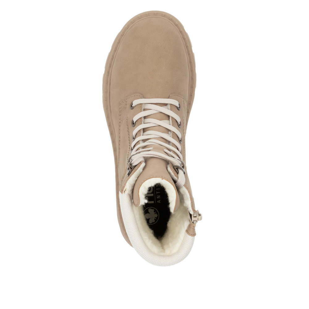 detail Dámská kotníková obuv Rieker 70403-20 béžová