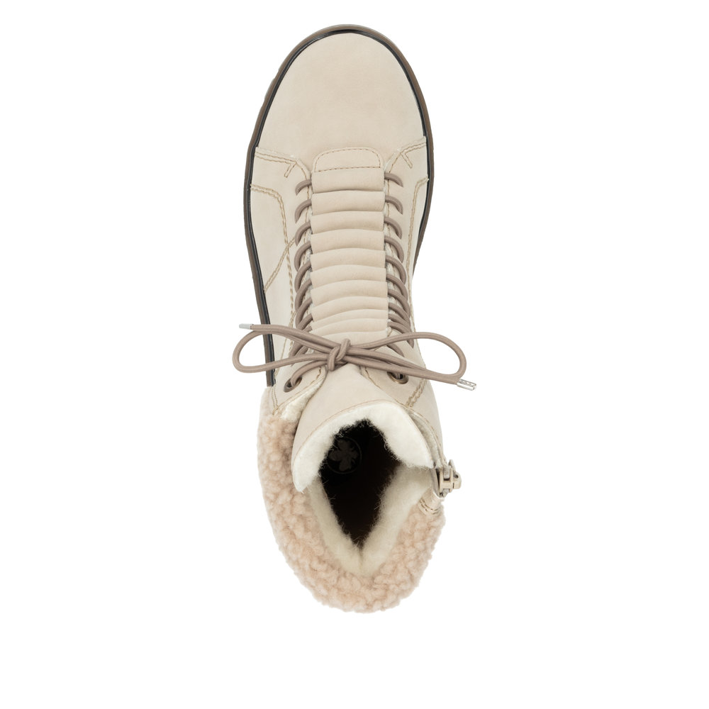 detail Dámská kotníková obuv Rieker Y3467-62 béžová