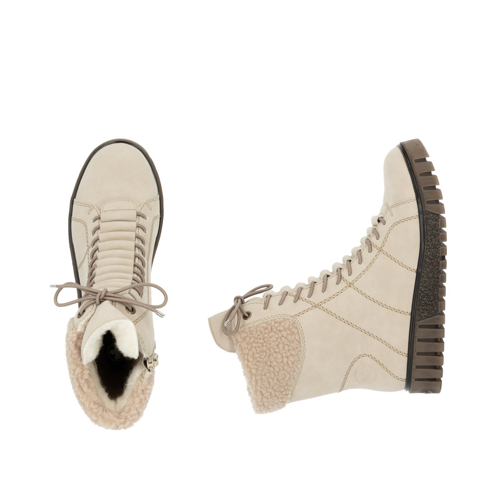 detail Dámská kotníková obuv Rieker Y3467-62 béžová