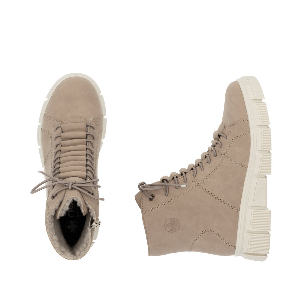 detail Dámská kotníková obuv Rieker X3428-20 béžová