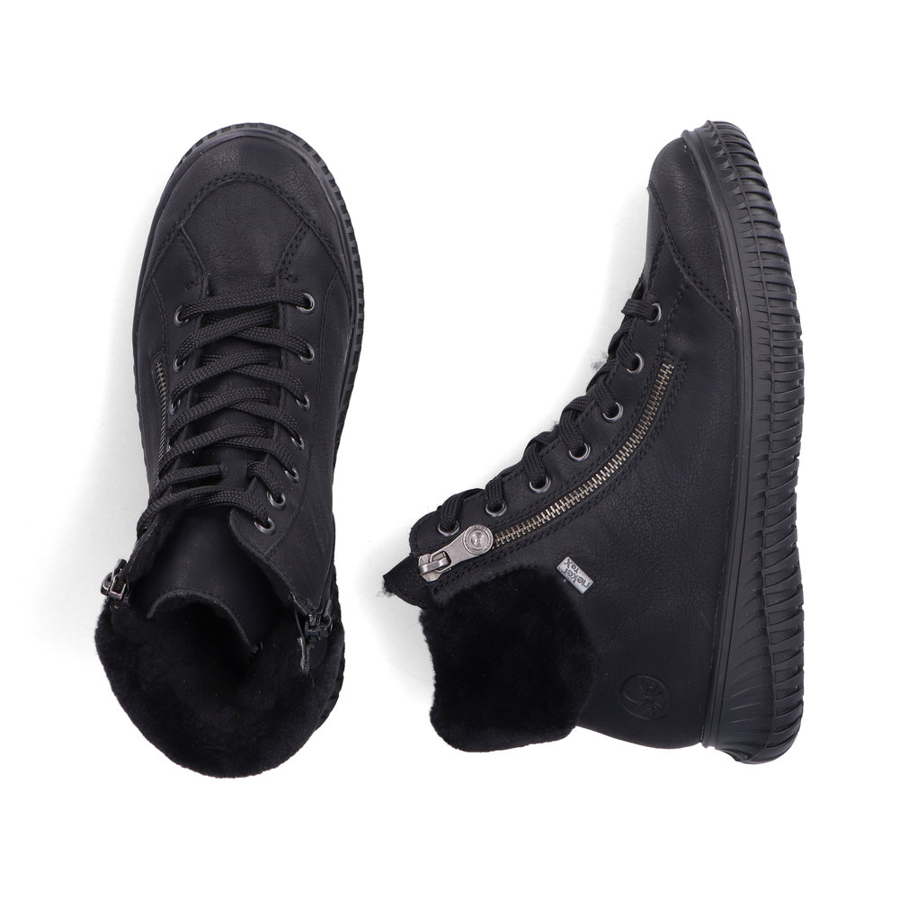 detail Dámská kotníková obuv Rieker 74244-00 černá