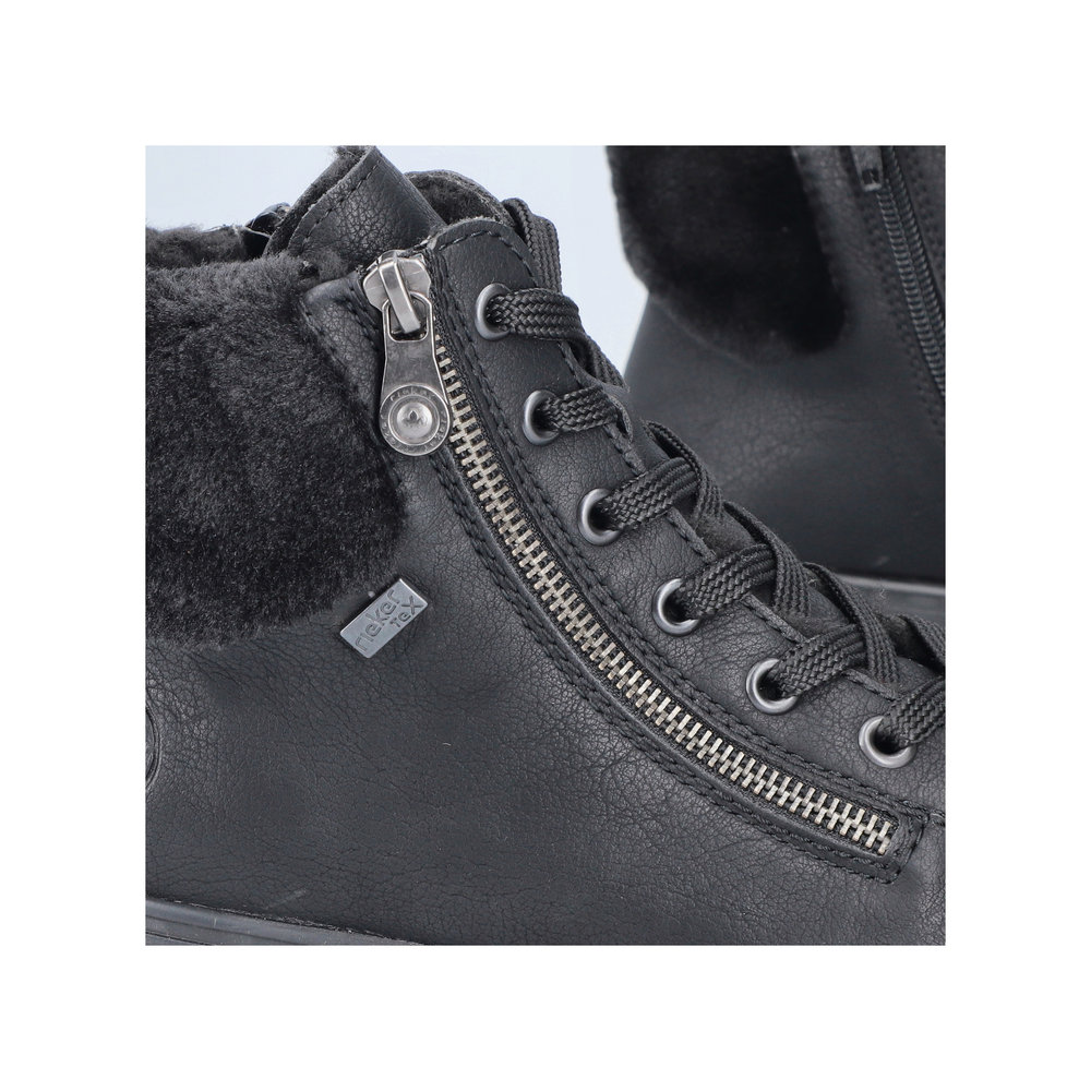 detail Dámská kotníková obuv Rieker 74244-00 černá