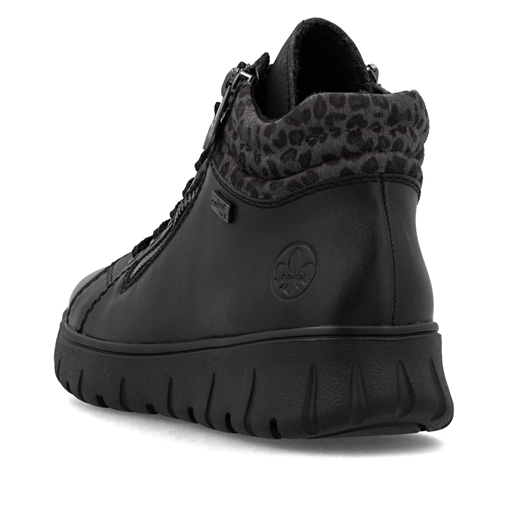 detail Dámská kožená kotníková obuv Rieker N1305-00 černá