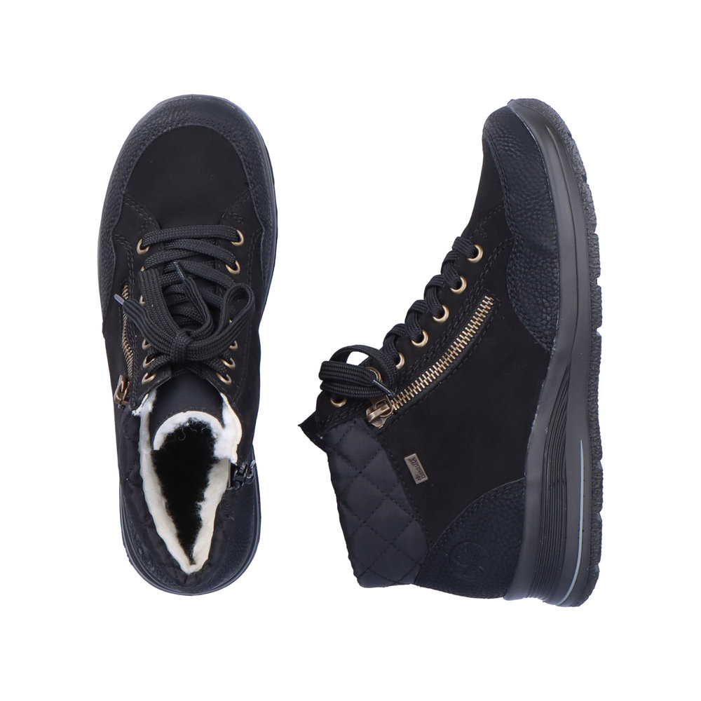 detail Dámská kotníková obuv Rieker L7701-00 černá