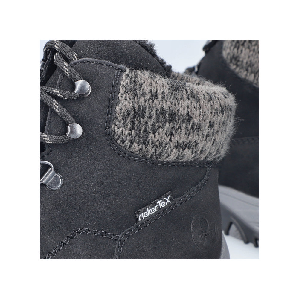 detail Dámská kotníková obuv Rieker M9610-00 černá