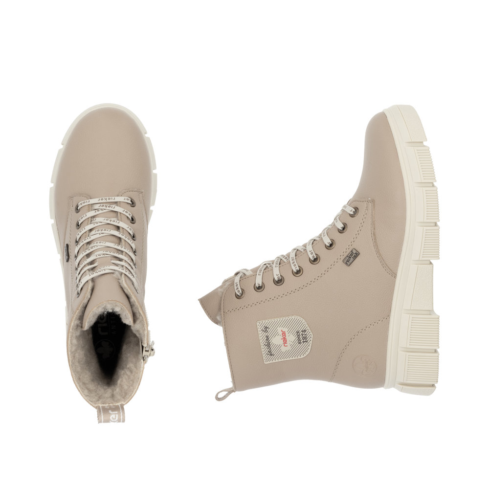 detail Dámská kotníková obuv Rieker X3410-20 béžová