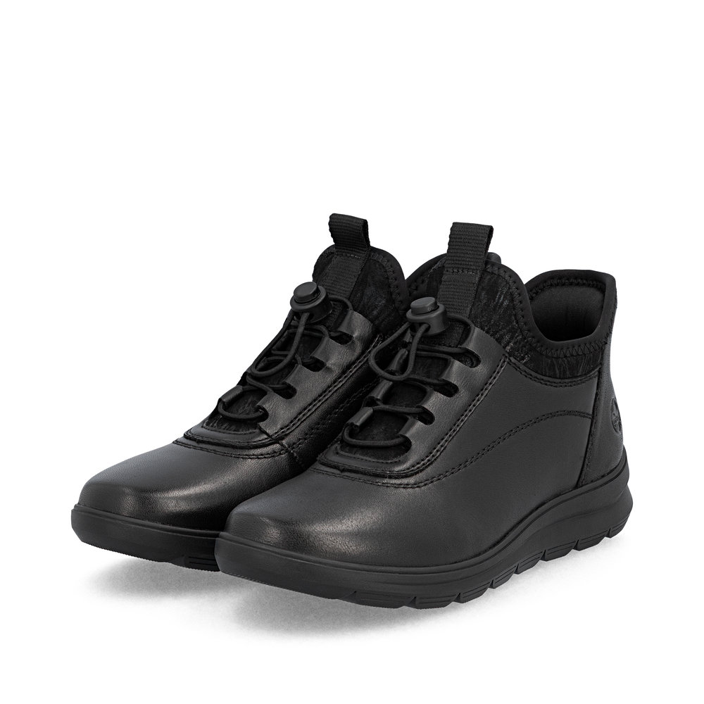 detail Dámská kotníková obuv Rieker Z0057-00 černá