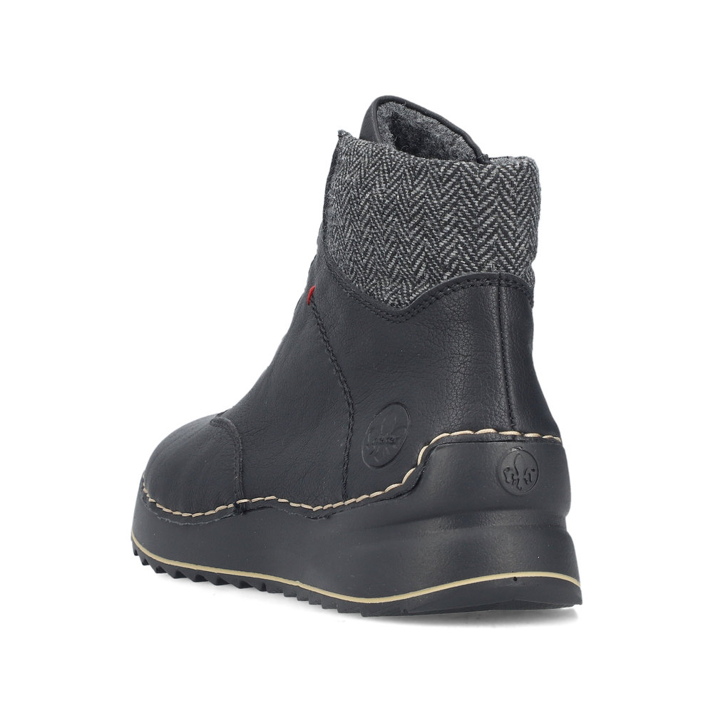 detail Dámská kotníková obuv Rieker 51553-00 černá