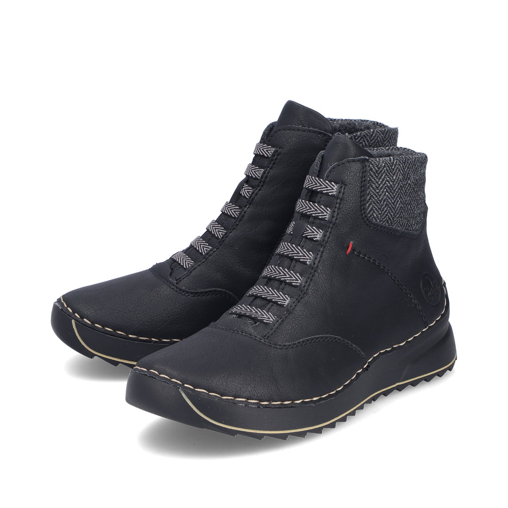 detail Dámská kotníková obuv Rieker 51553-00 černá