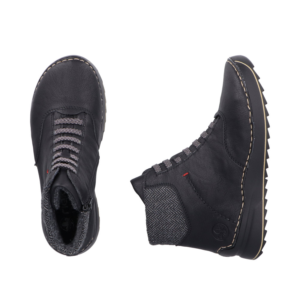 detail Dámská kotníková obuv Rieker 51553-00 černá