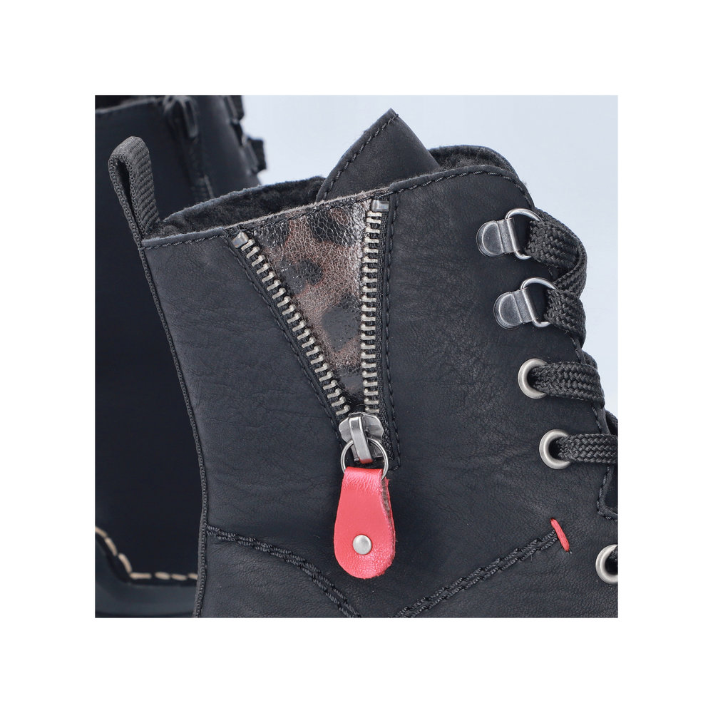 detail Dámská kotníková obuv Rieker 55014-00 černá