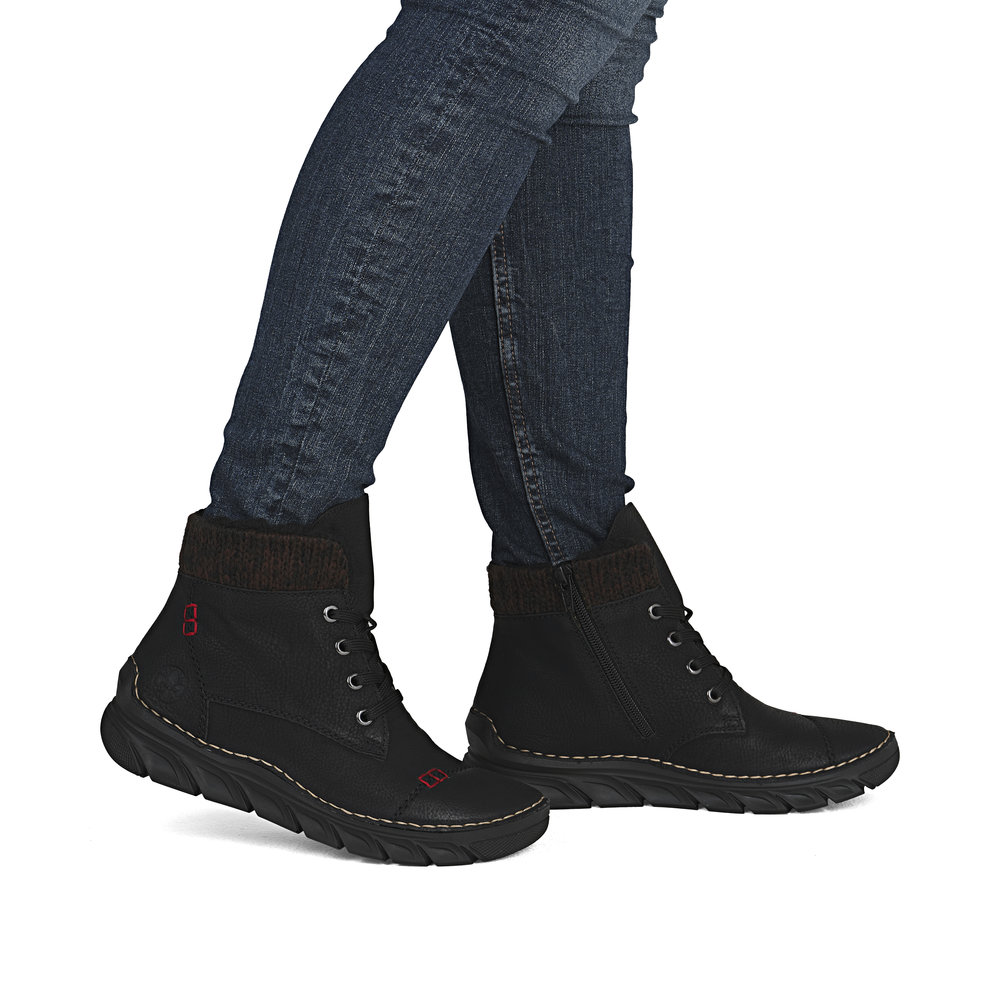 detail Dámská kotníková obuv Rieker 55031-00 černá