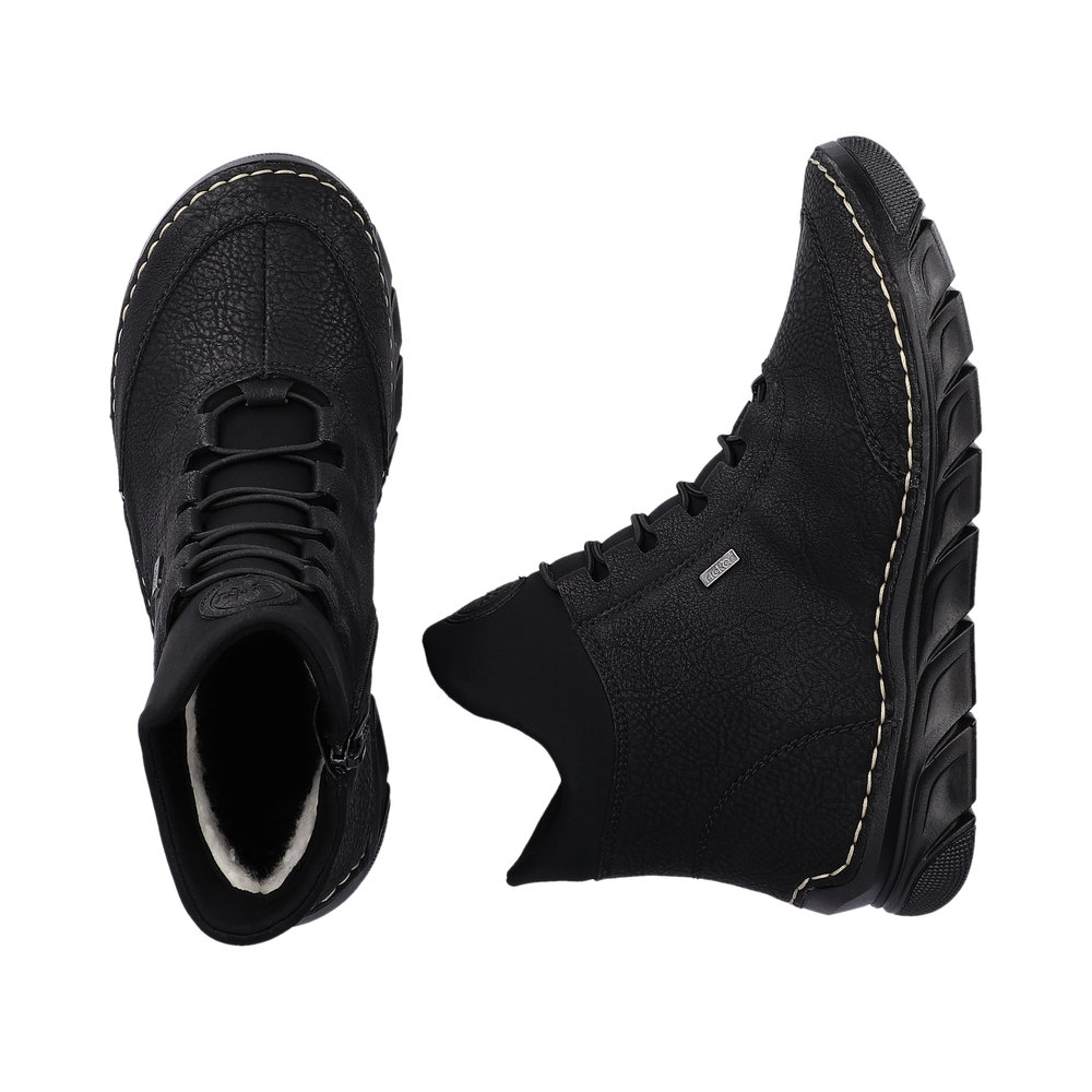 detail Dámská zimní kotníková obuv Rieker 55069-00 černá