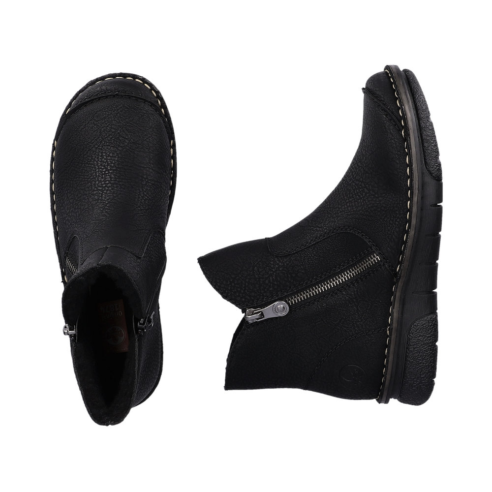 detail Dámská kotníková obuv Rieker 73357-00 černá