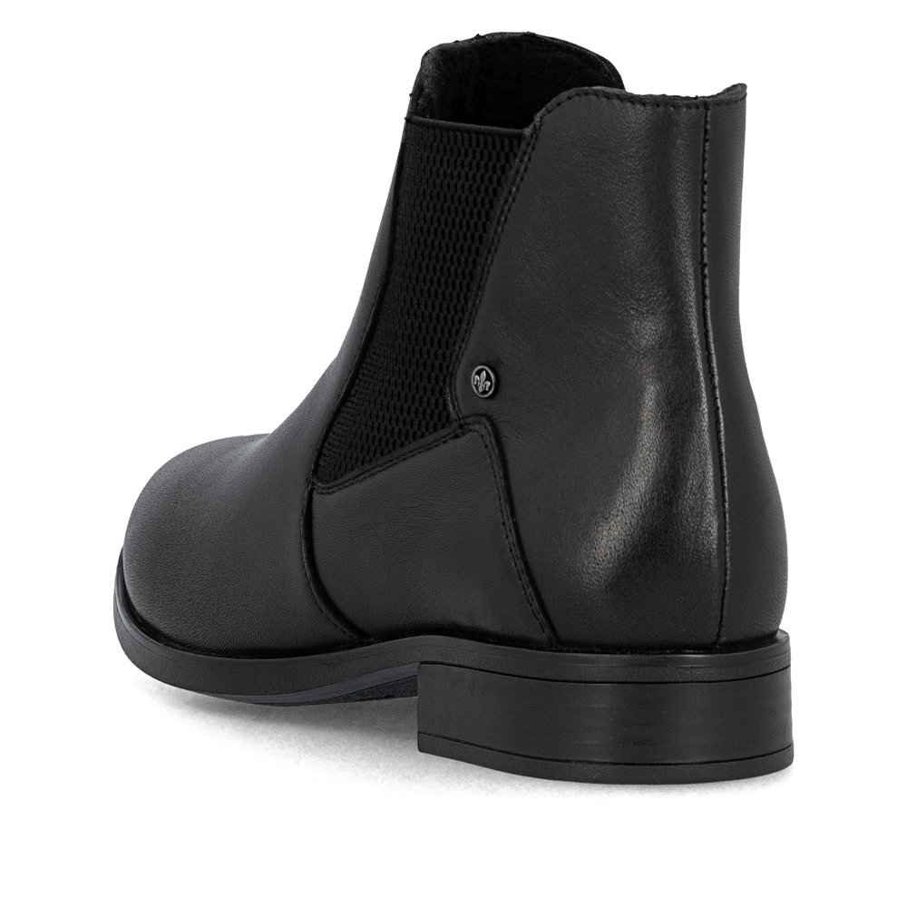 detail Dámská kožená kotníková obuv Rieker 77051-00 černá