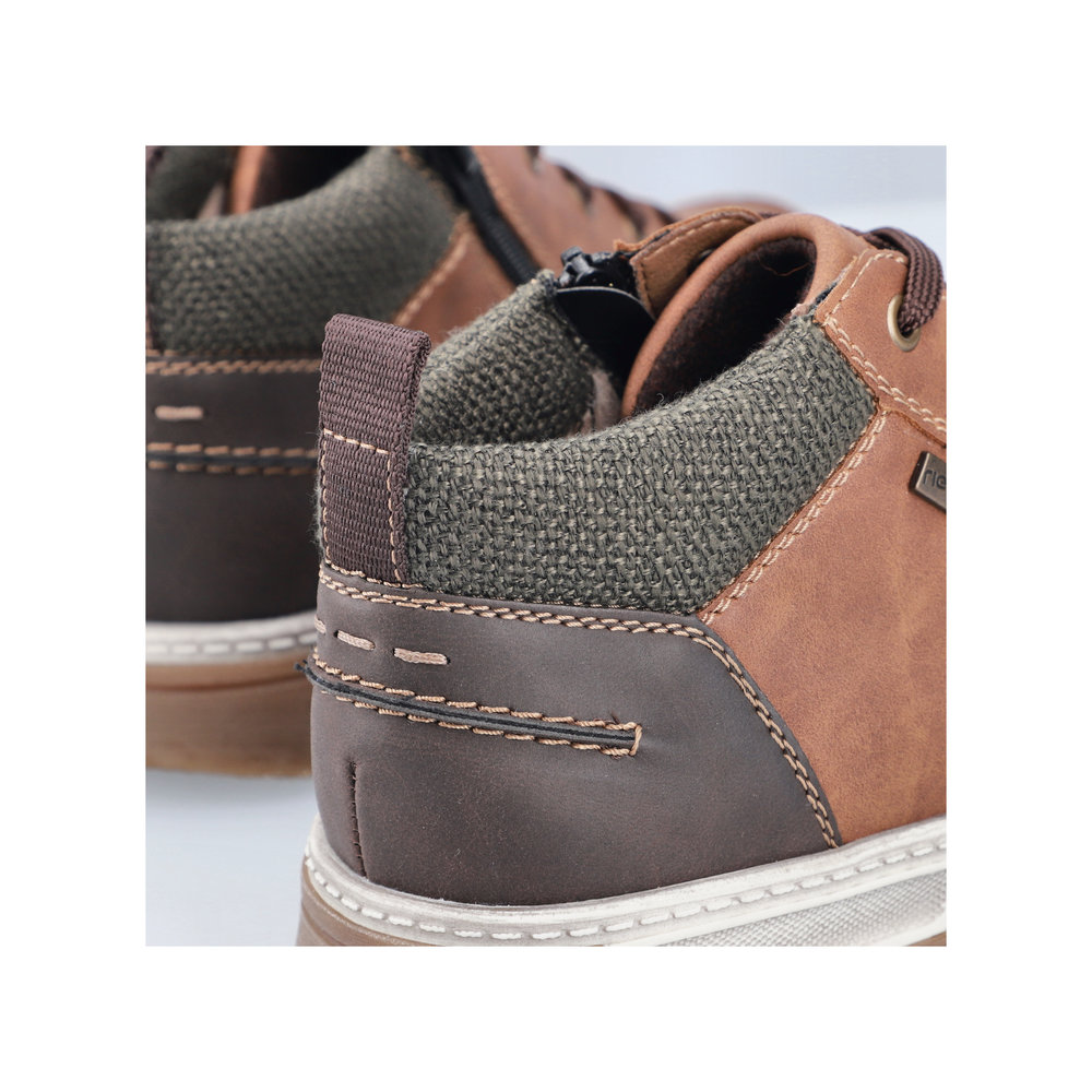 detail Pánská kotníková obuv Rieker 37011-24 hnědá