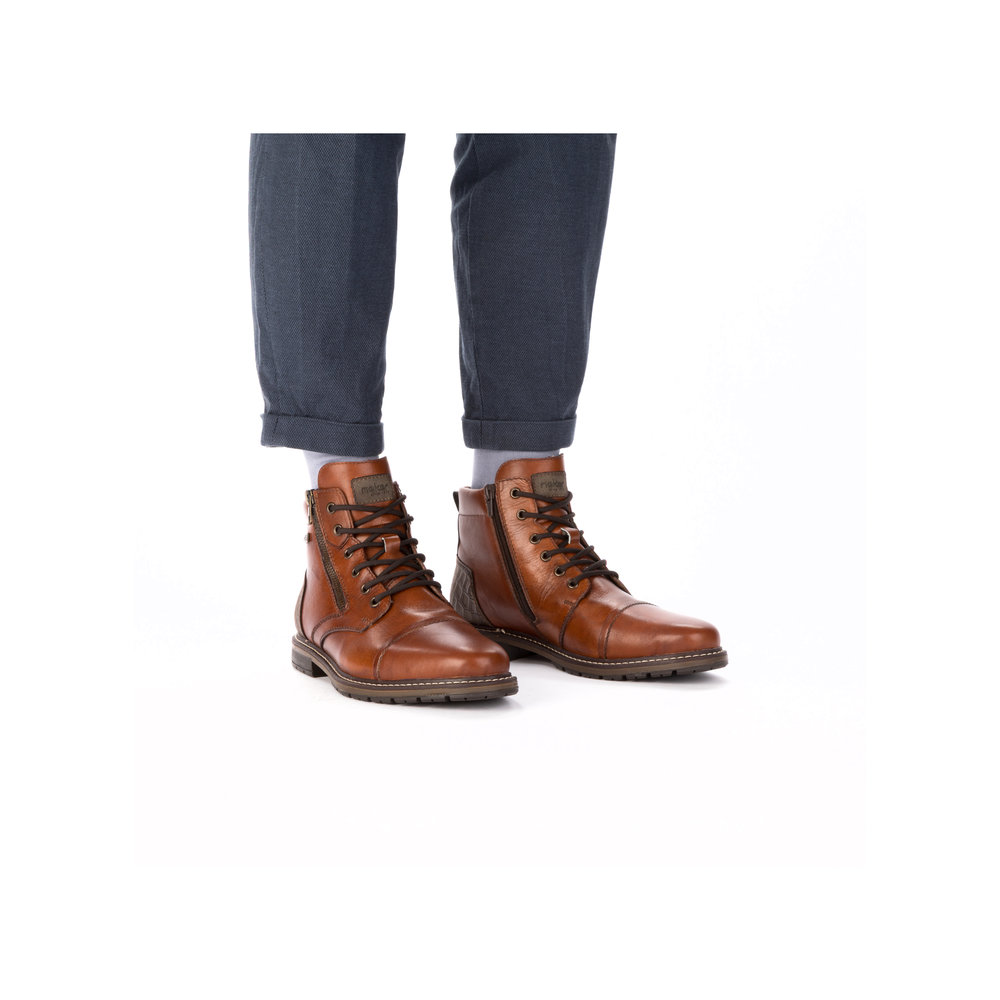 detail Pánská kožená kotníková obuv Rieker 13704-24 hnědá