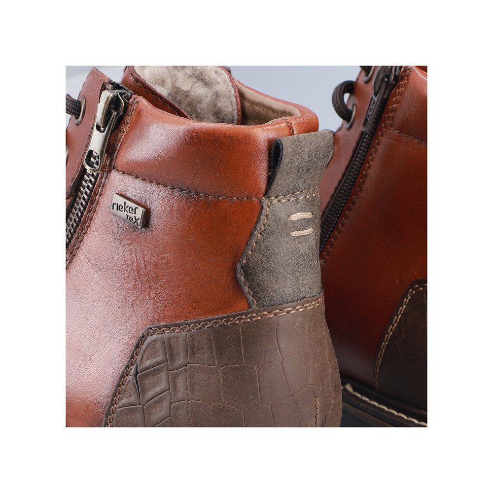 detail Pánská kožená kotníková obuv Rieker 13704-24 hnědá