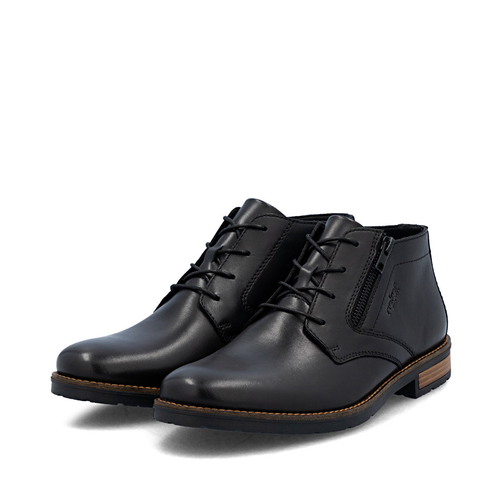 detail Pánská kožená kotníková obuv Rieker 14609-00 černá