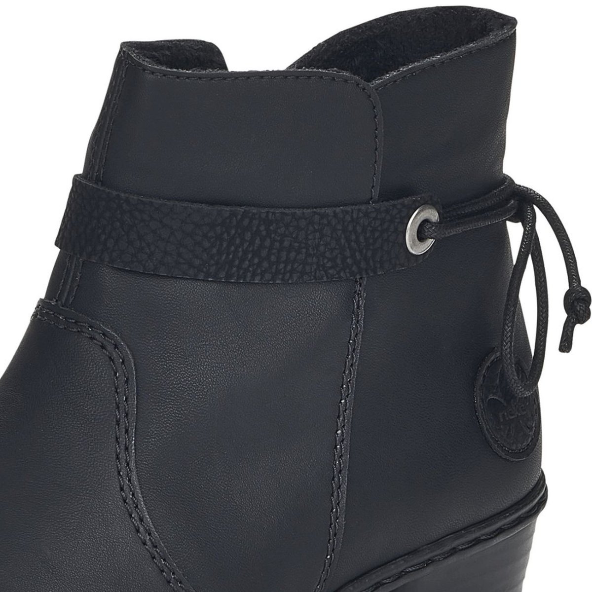 detail Dámská kotníková obuv Rieker Y0782-01 černá