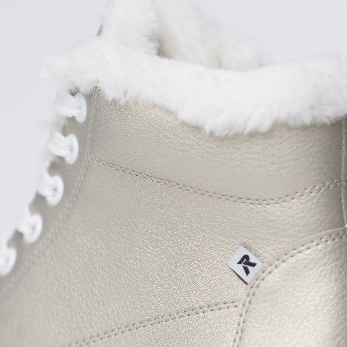 detail Dámská kožená kotníková obuv Rieker W1071-90 zlatá