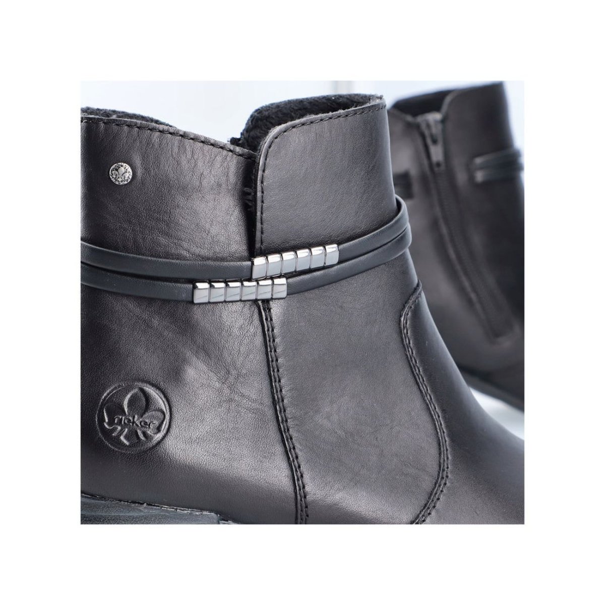 detail Dámská kožená kotníková obuv Rieker 70973-00 černá