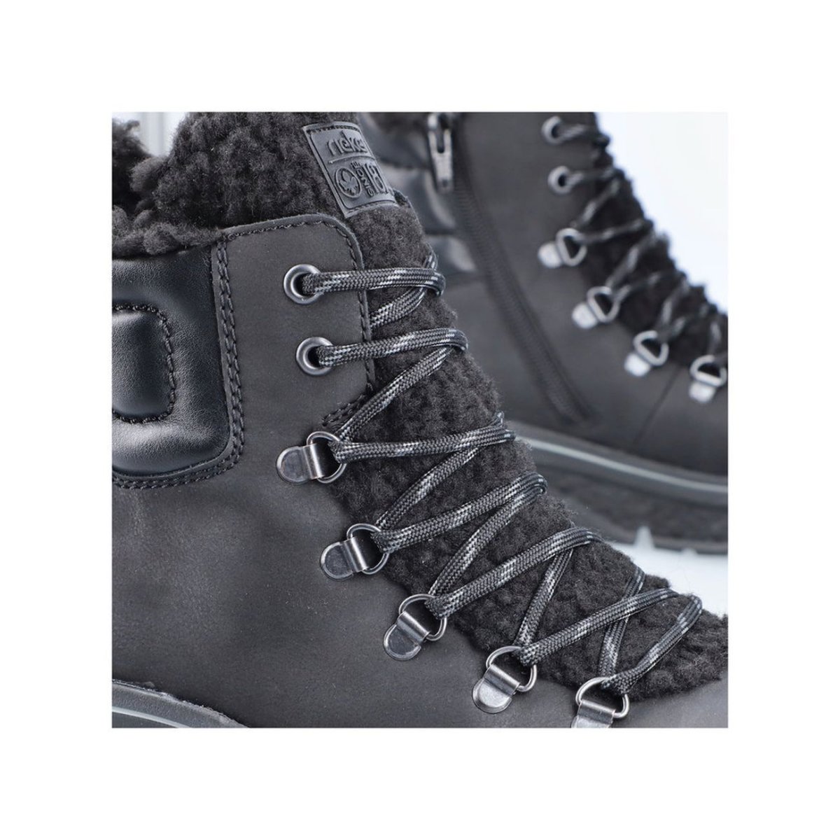 detail Dámská kotníková obuv Rieker 48030-00 černá